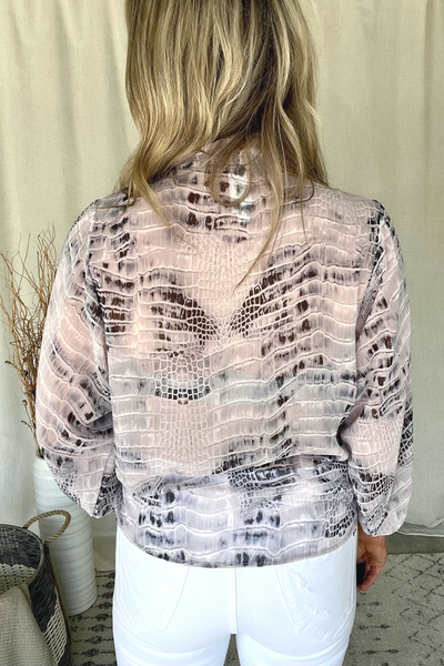 SNAKE PRINT WRAP BLOUSE