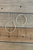 GOLD TEXTURED TWIST HOOP EARRING 2"