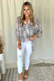 SNAKE PRINT WRAP BLOUSE