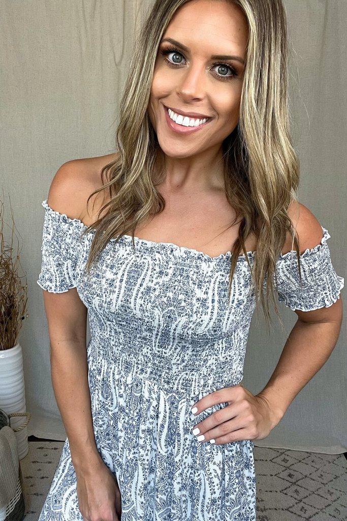 WHITE & BLUE SMOCKED FLORAL PRINT MAXI DRESS Boutique by Alexia WHITE & BLUE SMOCKED FLORAL PRINT MAXI DRESS Boutique by Alexia