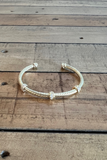 GOLD CABLE CUFF BRACELET WITH THREE CZ BEADS